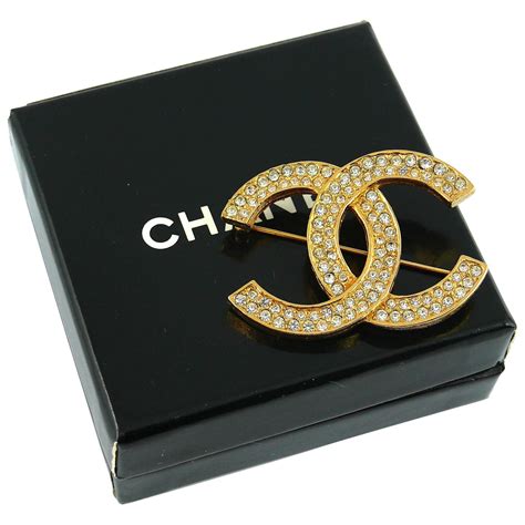 vintage Chanel pins brooches